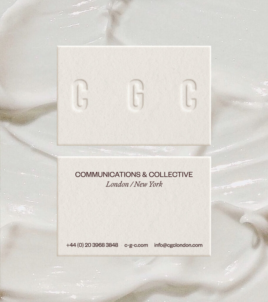 The image shows the design of Clare Goodwin Communications & Collective's business card, which has the brand's logo blind embossing on the front and their contacts on the back printed on luxury white cardboard.