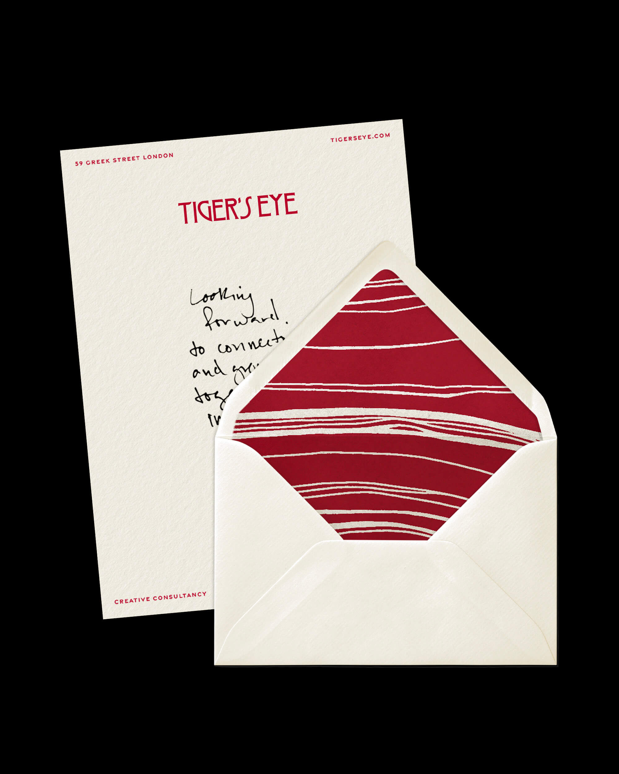 Envelope with Tiger’s Eye elegant red pattern with white stripes on the intern and a letter undearneath displaying the agency’s logo and a handwritten thank you message